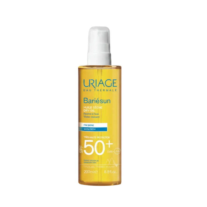 Uriage Bariesun SPF 50+ dry oil bottle with droplets on a white background