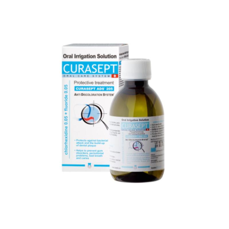 Packaging and bottle of CURASEPT oral irrigation solution, with product information.