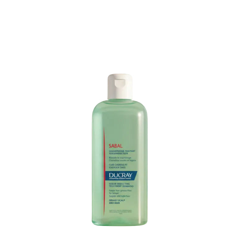 Bottle of Ducray Sabal Shampoo with green and red label, indicating it is a medicated shampoo for oily scalps.