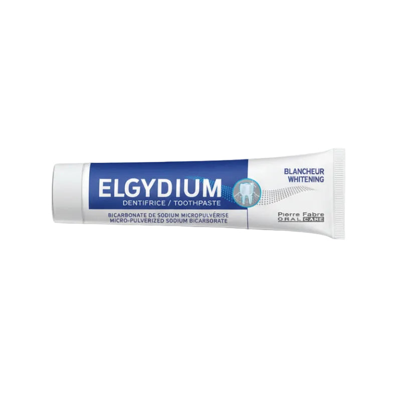 A tube of ELGYDIUM dentifrice whitening toothpaste with a blue and white packaging.