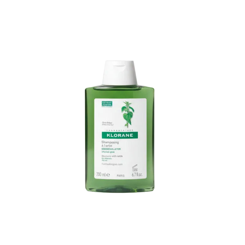 Klorane shampoo bottle on a white background