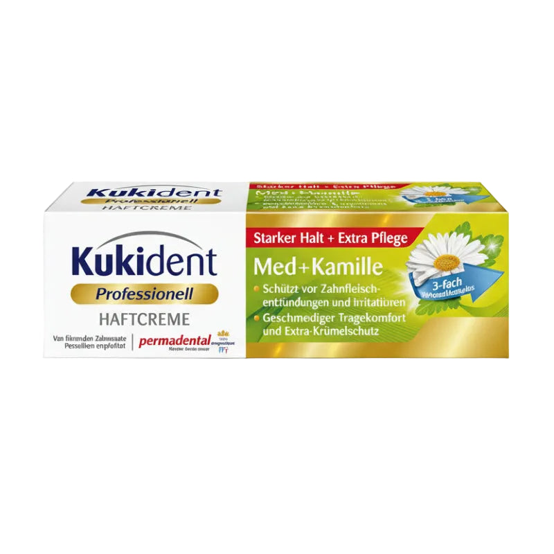 Box of Kukident Krem, a denture adhesive cream with chamomile, highlighting extra hold and comfort.