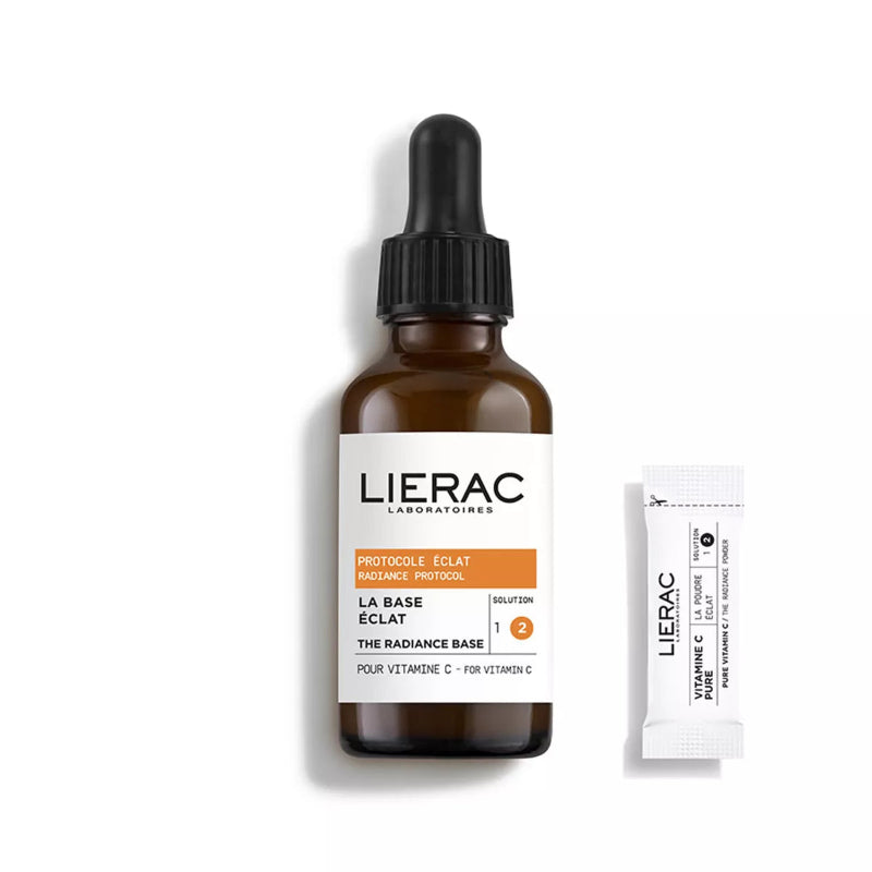 Lierac skincare product with dropper bottle and sachet on a white background