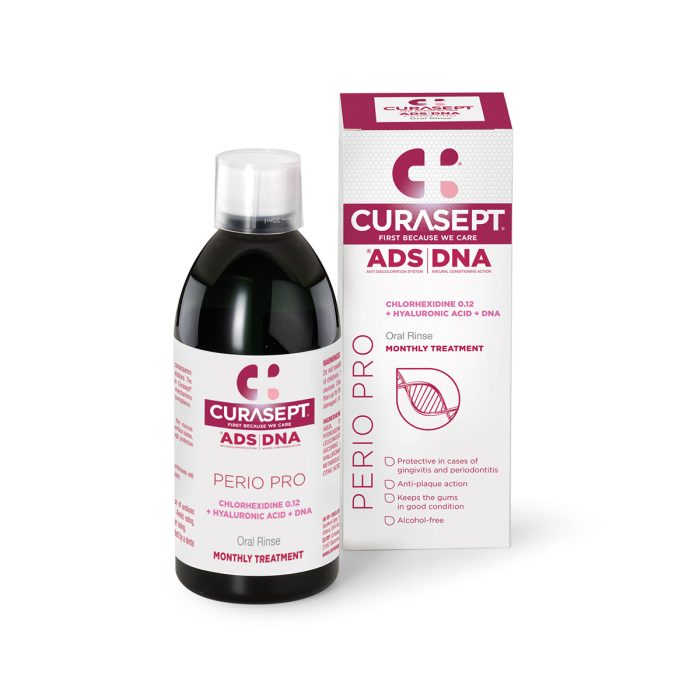 Packaging and bottle of Curasept ADS Perio mouthwash, with product information and branding visible.