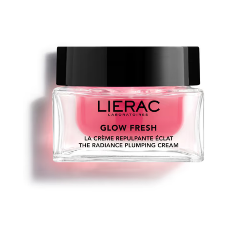 Lierac Glow Fresh plumping cream in a clear glass jar with a black lid, showing a vibrant pink cream inside, set against a plain white background with a soft shadow.