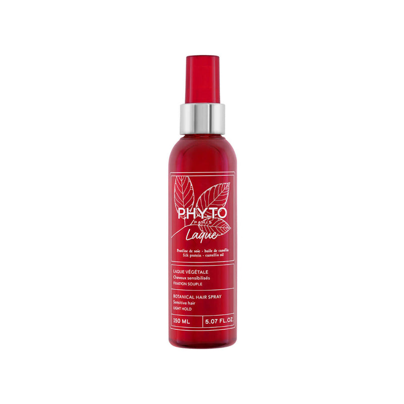 Red hair spray bottle with silver nozzle on a white background